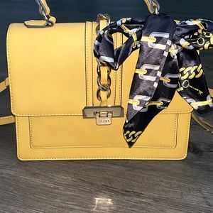 Aldo yellow hand bang with bow